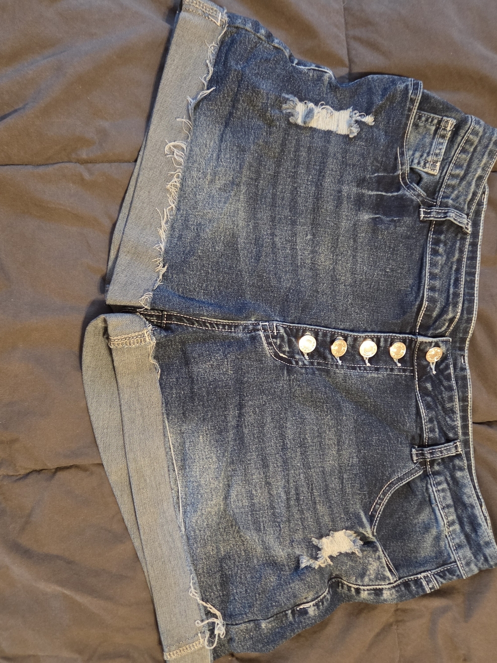 High-Rise Distressed Denim Shorts in Dark Blue - Women's